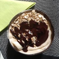 Penaut butter oatmeal. Toppings: chocolate, banana, granola at Sorrir in Wroclaw