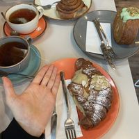 Croissant alle mandorle ( mio ragazzo ha una mano molto grande, la foto non rende ma è enorme! 😂)   at Arapina in South East London