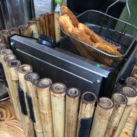Churros in the fryer at Brazilian Churros - Food Stand in South East London