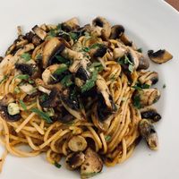 Spaghetti with tomato sauce, arugola pesto and mushrooms  at Försters in Offenbach