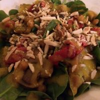 Sweet potato salad with roasted red pepper, chickpeas, spinachs, almonds and mango sauce at Bruta Flor in Lisbon