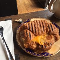 hot toasted croissant with tomato pesto and cheese at The Cran in Glasgow