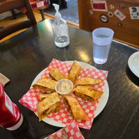Pizza roll & garlic dipping sauce at The Hearty Hooligan in Hamilton