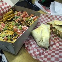 Loaded nachos and crunch wrap at The Hearty Hooligan in Hamilton