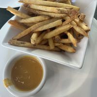 Fries with cheese dip  at Hearts Choices - NorthEast in Calgary