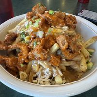 Poutine with added buffalo chicken on top  at Hearts Choices - NorthEast in Calgary