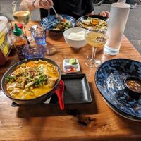 laksa in the front; stir fried vegies in soya bean sauce at the back at CHOW in Darwin