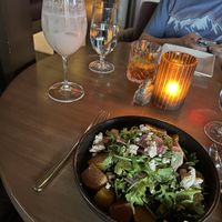 Beet salad and Peachy Keen drink    at Wynn Hotel - La Cave in Las Vegas