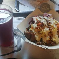 Bowl with Agua de Jamaica at Pot in Bogota