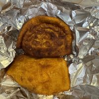 Apple & Rosemary and Deep Fried Buffalo Potato pierogies - got with vegan sour cream!  at Pierogi Mountain in Columbus