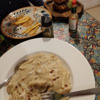 cheezy pasta and tandoori burger at Rare Earth Cafe & Organic Store in Mumbai