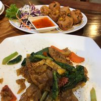 Fried balls and half eaten pad see ewe at Yo Vegan in Phuket