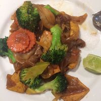 Veggie tofu stir-fry with wide flat rice noodles. 150THB. (Partially eaten like most of the pics I contribute!) at Yo Vegan in Phuket