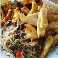 Satay tofu with noodles and chips. I do not own this photograph. at Hey Hey in Deal