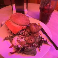 Red lighting because of closing time, but the food did look great on the plate   at Jonny Aldana in Barcelona