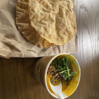 Carrot and sweet potato soup with pumpkin seeds, coriander and papadums  at What'Soup in Oslo