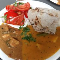 Dal, curry, chapati, rice, and "salad" at Hariprasad Samosa & Curry in Krakow