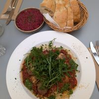 Vegan bolognese spaghetti, horseradish dip with breads at Knol & Kool Bistro & Superet in Ghent