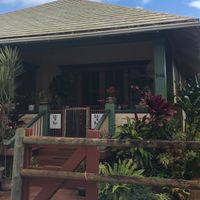 house in front of the cafe; walk alongside the right of the house. cafe is in the back. at The Greenery Cafe in Lihue