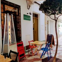 Cute outdoor seating at Taberna La Buganvilla in Algeciras
