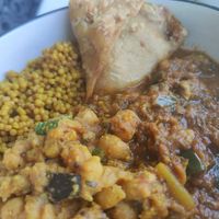 Aubergine curry, chana masala, and a samosa (the tumeric couscous was all my doing) at Babita's Spice Deli in Swansea