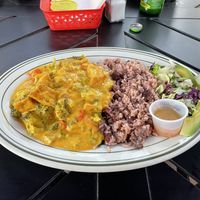 Curry tofu w rice and peas and salad. Vegan w/o any changes    at Sipho's Restaurant and Cafe in Chico