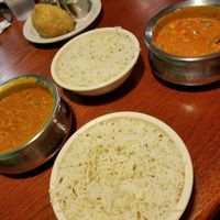 This was the dal tadka (left) and vegetable jalfrezi (right) that my mother and I shared; both came with bowls of steamed rice. at Cumin Indian Cuisine in Kalamazoo