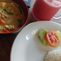 I didn't get any good overview shot, so here's 3 slightly-blurry images that might tell the story.

(Tofu+tempe curry plus watermelon juice) at Memoh Warung in Canggu