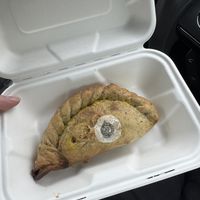 Curried cauliflower pasty (heated up) - amazing!  at RSPB Loch Leven Cafe in Kinross