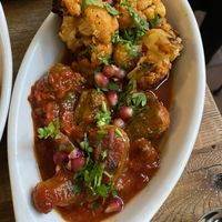 Okra on the bottom, cauliflower(chili, garam massala, honey..) at Yalla Yalla Foodbar in Den Bosch