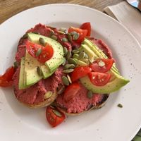 Avocado, hummus and tomatoes on toast   at Iydea in Brighton