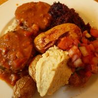 Corn cakes hummous and side salad at Iydea in Brighton