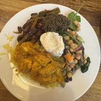 Tofu curry, bean salad, chickpea salad, olive tapenade and vegan garlic aioli   at Iydea in Brighton