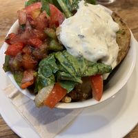 Small side - Potato wedges, tomato salad, salsa and tzatziki - £7.90 to sit in  at Iydea in Brighton