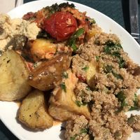 Vegan lasagna as main, potatoes, quinoa salad, spicy vegan aioli and hummus  at Iydea in Brighton