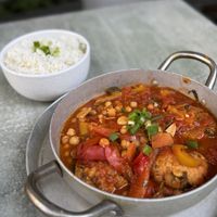 Tofu patties in tomato chickpea saucee  at Goodness in Tel Aviv