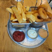 Fries and onion rings at Goodness in Tel Aviv