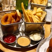Onion rings and fries at Goodness in Tel Aviv