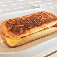 Panini with salami, cheese, tomato & jalapeños, £5.00. at Vegan HQ in West London