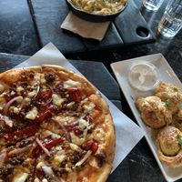 Garlic knots, Mac and cheese skillet, sweet pepper and sausage pizza  at Virtuous Pie in Portland