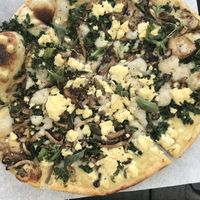 The white pie w/ mushrooms and sautéed kale added at Virtuous Pie in Portland
