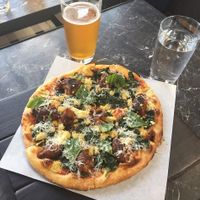 MEATBALL + CHEVRE 
San Marzano Tomato Sauce, Baerlic Brewing Chorizo Meatballs, Creamed Spinach, Lemon Herb Chevre, Basil, Fresh Parm at Virtuous Pie in Portland