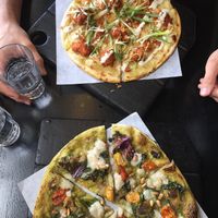 Ultraviolet and stranger wings pizza at Virtuous Pie in Portland