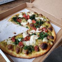 Superviolet pizza with kale, cashew moz, pine nuts, and pesto at Virtuous Pie in Portland