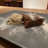 Vegan walnut cake with ice cream at Organic Pizza in Salzburg