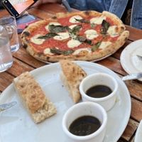 pizza and bread  at Donna Jean in San Diego