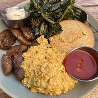 Brunch “The Motherload”. Tofu scramble with smashed potatoes, greens and cornbread   at Donna Jean in San Diego