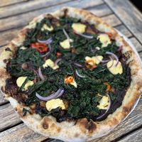 Widow Pizza. Best pizza on the planet! Add the garlic butter crust dip.  at Donna Jean in San Diego