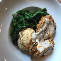 Chicken-fried shrooms with biscuit, gravy and greens. 1000% delicious!  at Donna Jean in San Diego