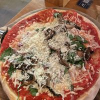 Vegan Margherita pizza with garlic mushrooms, spinach, and red onion   at The Stable in Birmingham